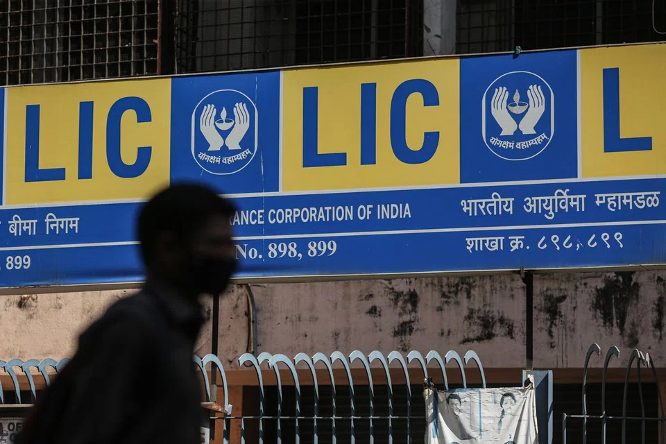 INDIA chose to slash the size of its biggest initial public offering (IPO) by about 60 per cent and press ahead with the sale next week as investor demand wanes amid the war in Ukraine. 