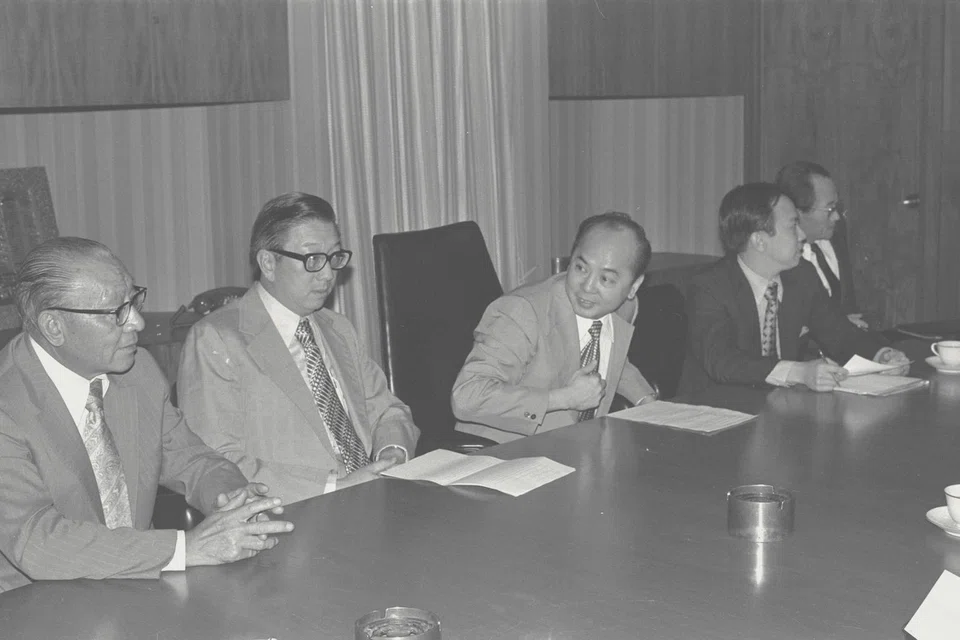 Wee's (third from left) reputation for shrewd and careful management is a key reason UOB has long been viewed as a blue chip company