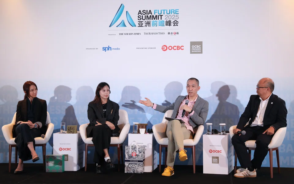 The panel discussion on consumer trends at Asia Future Summit 2025, from left: Cheryl Cheong of Samsung Electronics Singapore, Li Simeng of Chagee and Lien Choong Luen of Gojek. The panel discussion was moderated by Jeremy Au Yong, associate editor of The Straits Times.