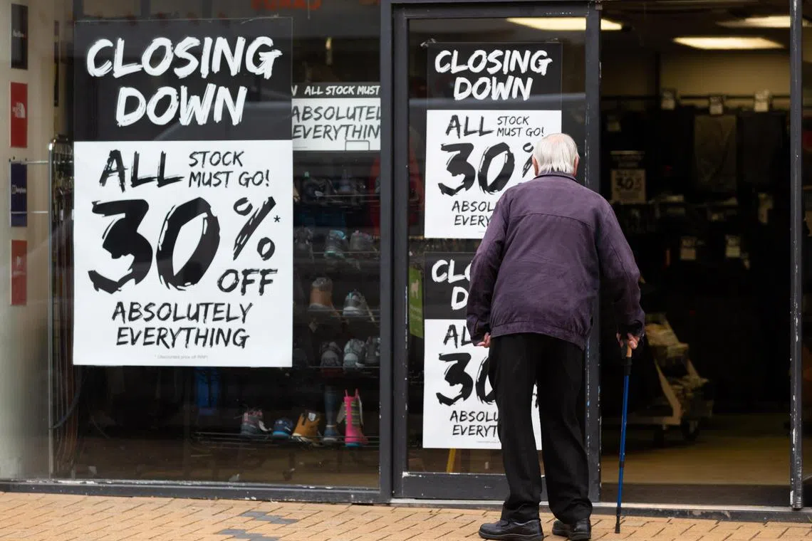 Closing-down signs at a shop in Huddersfield, UK. A study by the Centre of Economic Reform suggests that UK gross domestic product is 5.5 per cent lower than it would have been if Brexit had not happened.