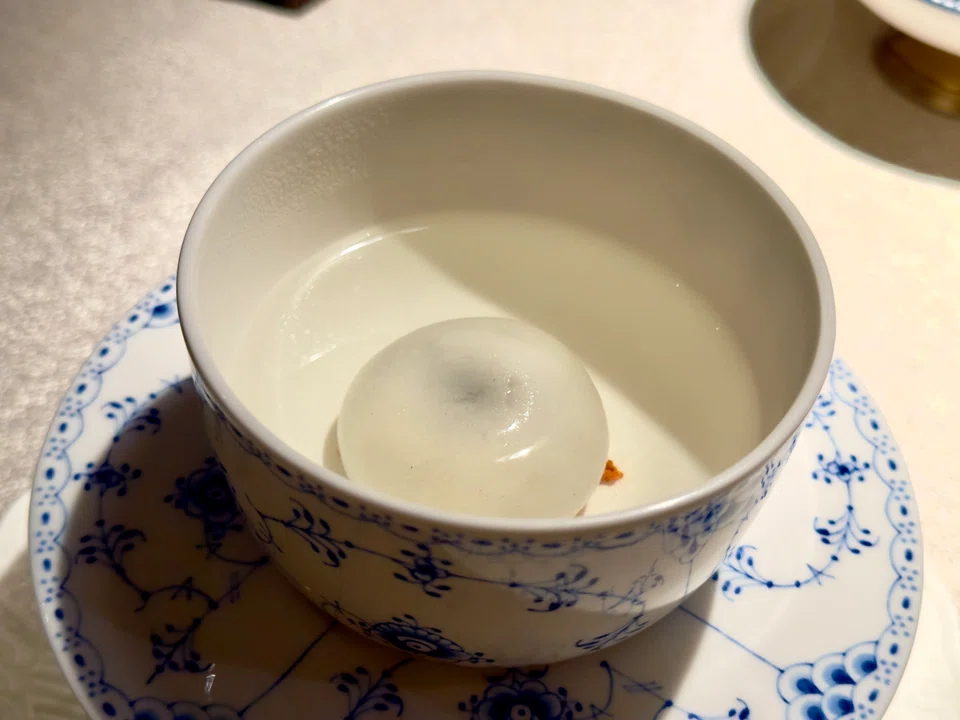 Glutinous rice ball filled with black sesame paste.