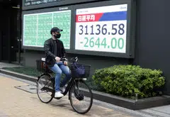 The moves in credit mirror a selloff in stocks around the region on Monday, with equity gauges from Sydney to Tokyo plunging. 