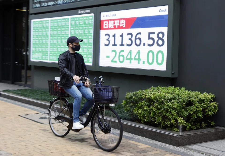 The moves in credit mirror a selloff in stocks around the region on Monday, with equity gauges from Sydney to Tokyo plunging. 