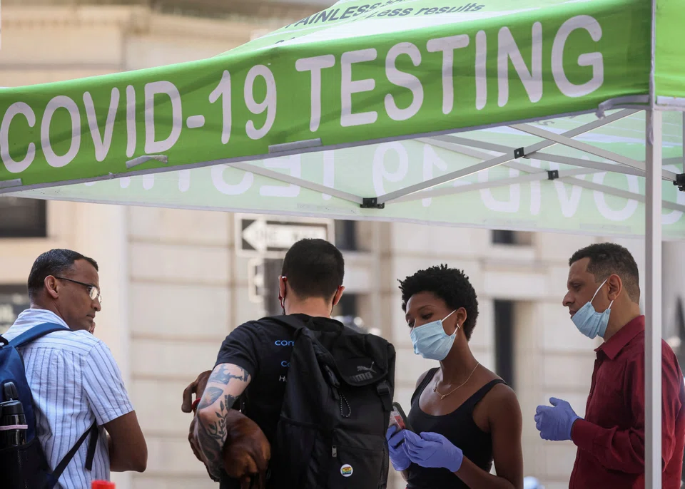 People wait to take Covid-19 tests at a pop-up testing site in New York City, July 11, 2022.  