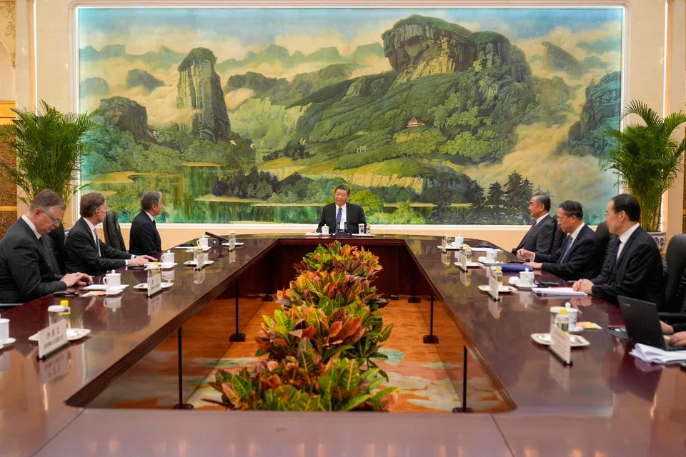 China's President Xi Jinping (C) meeting with US Secretary of State Antony Blinken (3rd, L) at the Great Hall of the People in Beijing. Xi says there are still a number of issues that need to be resolved, and there is still room for further efforts.