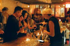 Patrons at Sauced, a wine bar in the Williamsburg neighbourhood of Brooklyn, Sep 6. Some Gen Z-ers and young millennials say the culture and aesthetics of wine meld with their lifestyles, whether they're drinking or not. 