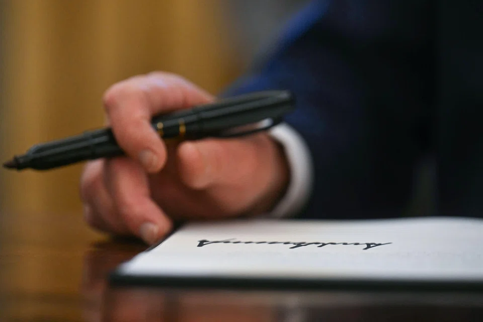 US President Donald Trump signs an executive order to create a US sovereign wealth fund on Feb 3. The fund could be used as a catalyst for American investment in areas considered national security priorities, says a source.