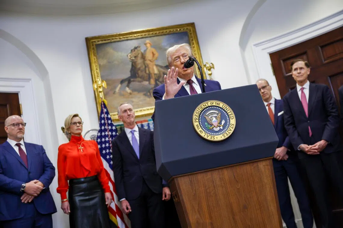 US President Trump, with pharmaceutical executives, delivers remarks on lowering the prices of drugs and pharmaceuticals at the White House in Washington, D.C., Dec 19 2025. 