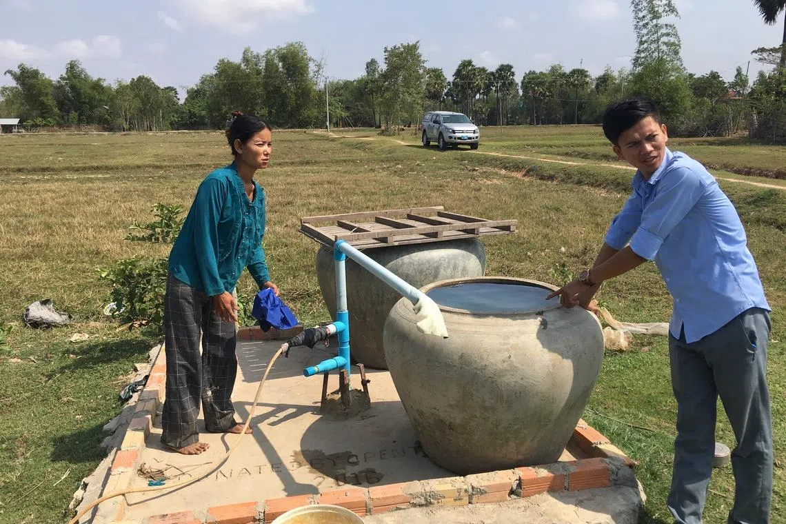 OHF staff and volunteers help to build wells in rural villages in Cambodia.
