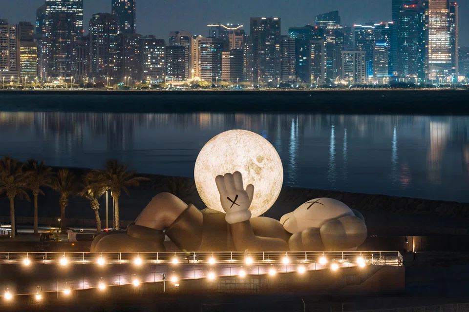 Kaws' massive Companion sculpture makes a splash at Souq Al Mina waterfront.