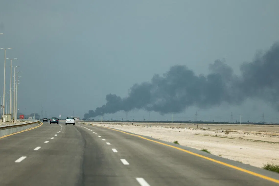 Smoke billows from Saudi Aramco's Ras Tanura oil refinery after a reported Iranian drone strike, Ras Tanura, Saudi Arabia, March 2, 2026. 