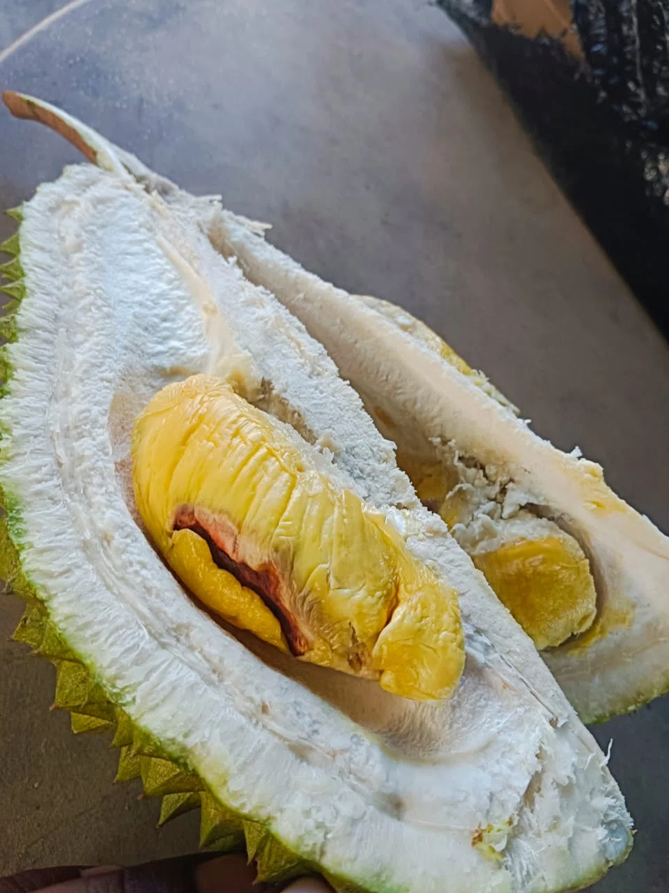 "Burnt seeds" in durians are often mistaken for worm infestations. 