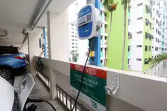 EV charging points in a multi-storey car park in Chai Chee. Sustainable financing is growing, thanks in part to the energy transition.