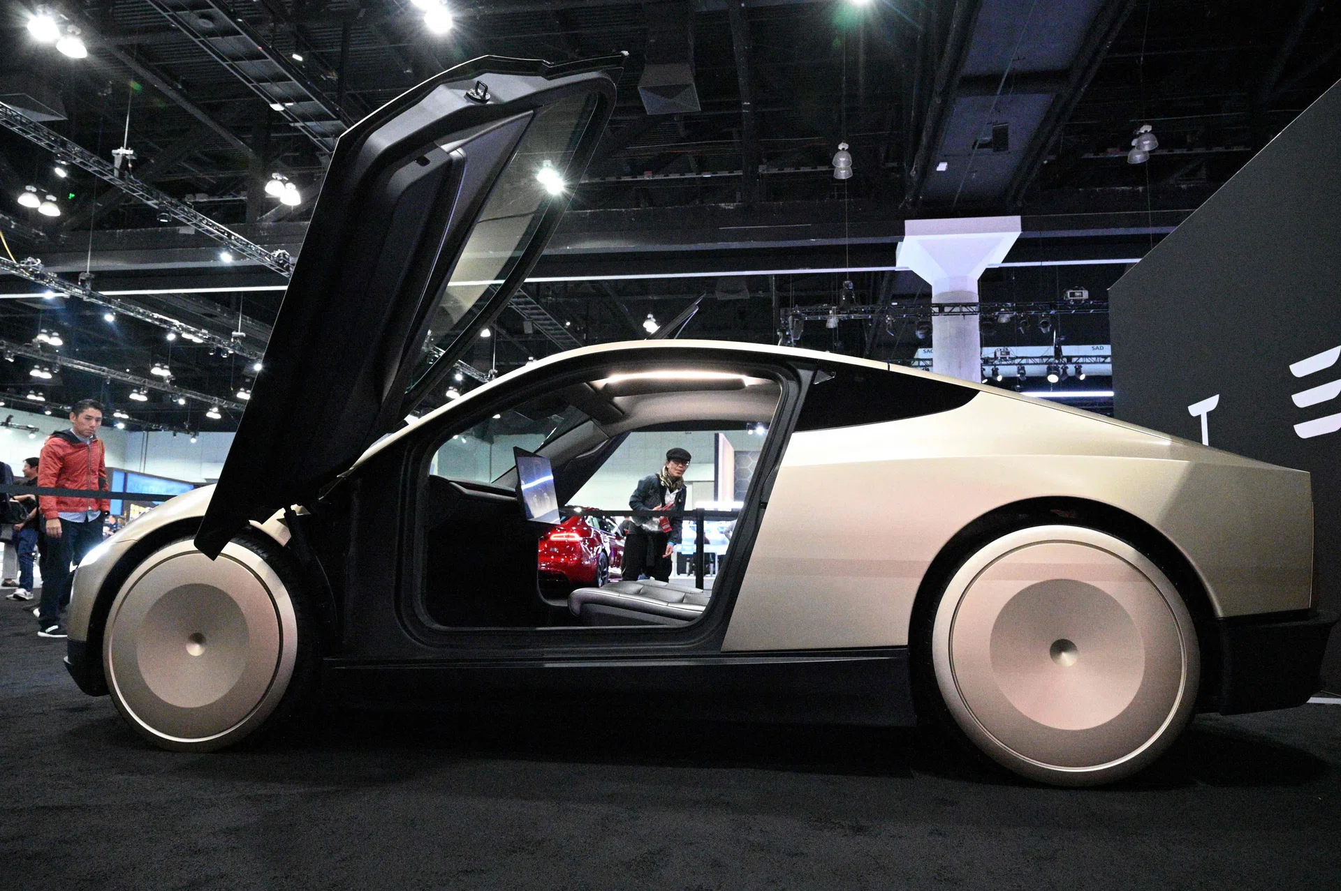 Tesla to roll out robotaxis in overdue step towards Musk dream - The ...