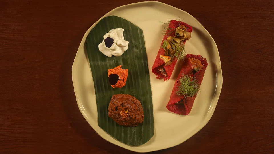 Beetroot thosai filled with sardines in Thosai Maati.