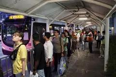 Passengers queueing for bridging bus services near Buona Vista MRT station at 7.30 pm on Sep 26. 