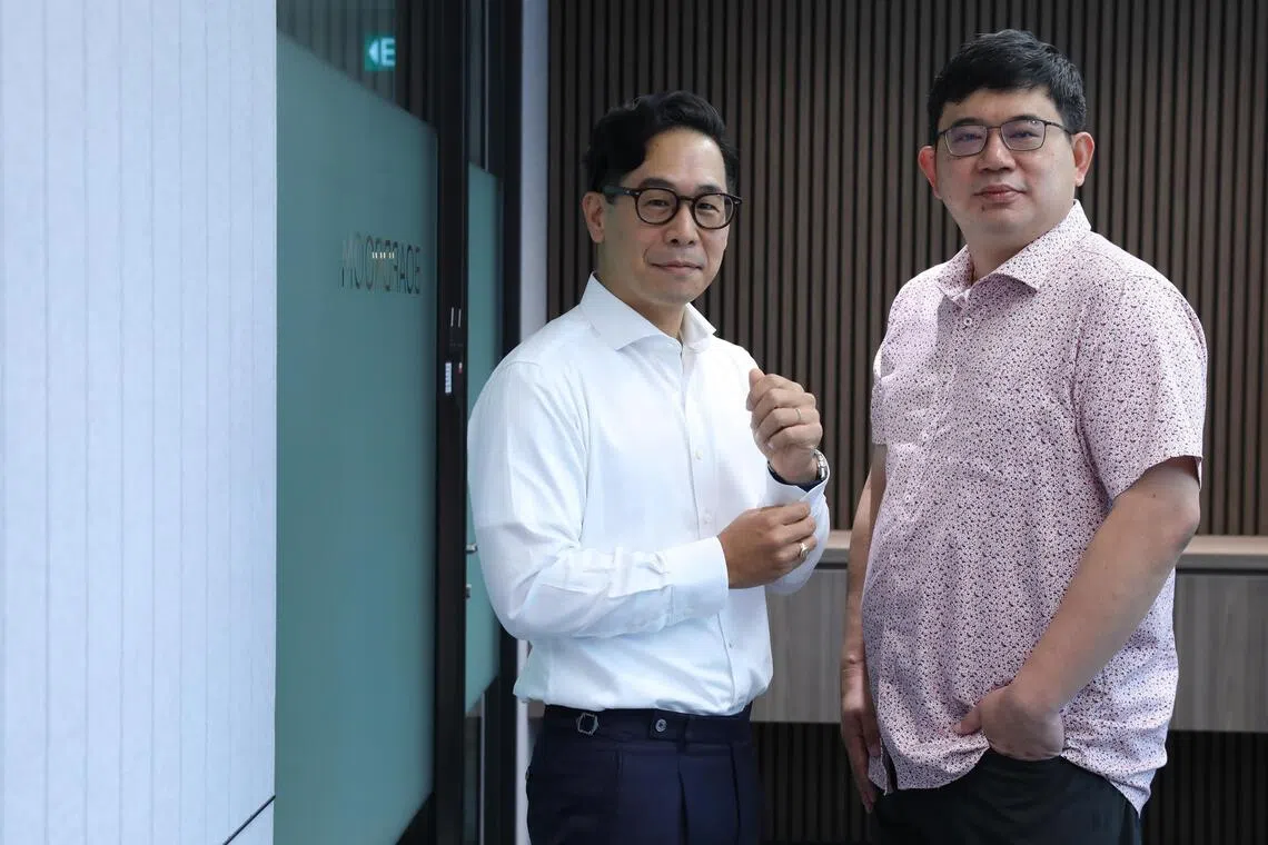 Aravest CEO Moses Song (left) with Wee Hur Property CEO Goh Chengyu.