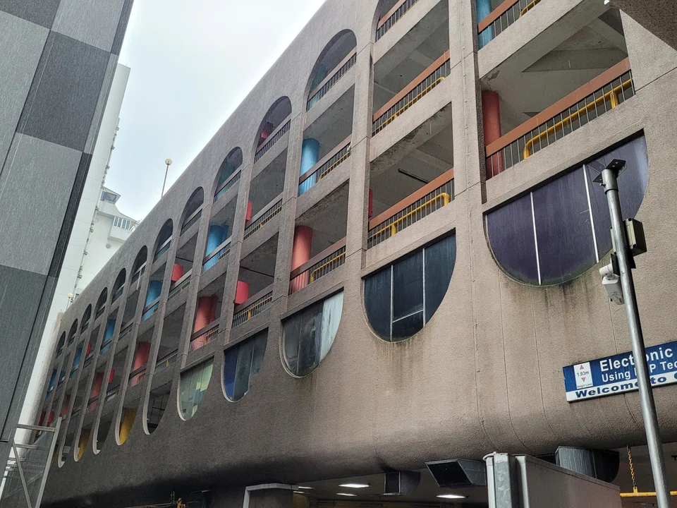 Golden Mile Tower's carpark also sports the building's signature capsule-shaped designs, though they are now obscured by another building.