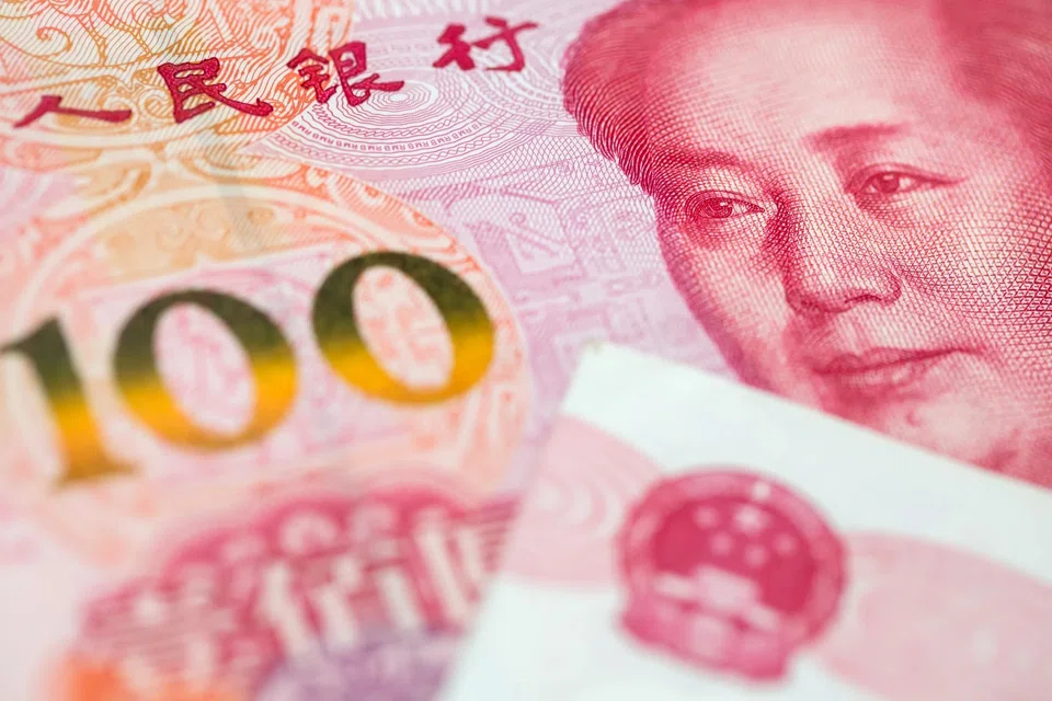 The overseas spending is contributing to a gloomy outlook for the Chinese currency. 