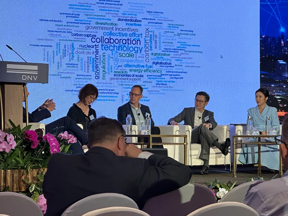 From left: DNV's Brice Le Gallo (partially hidden), CPC Taiwan's Jane Liao, Woodside Energy's Shaun Gregory and Keppel Infrastructure's Chua Yong Hwee at the DNV Singapore Energy Transition Conference panel discussion moderated by Yvonne Chan (far right).