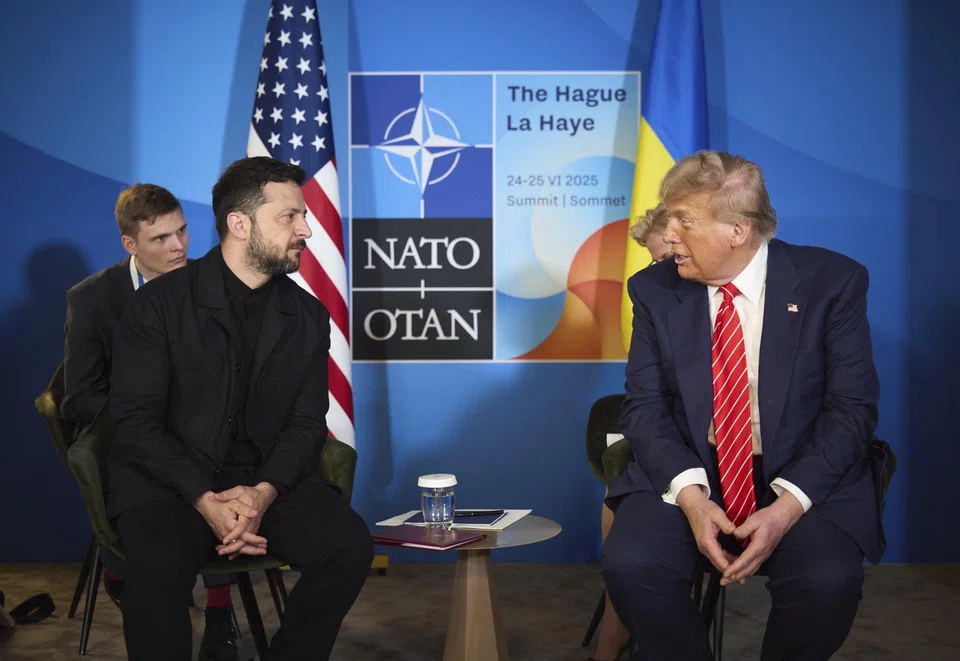 Ukrainian President Volodymyr Zelensky (left) and US President Donald Trump at a meeting on the sidelines of the Nato summit in The Hague, Netherlands, Jun 25. Ukraine depends on the US' supply of weapons in its fight against Russia.