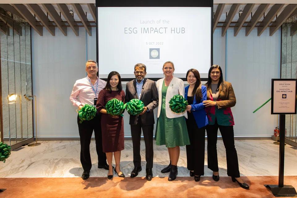 (From left) Anton Ruddenklau, global head of innovation for financial services at KPMG; Jaelle Ang, founder of The Great Room; MAS managing director Ravi Menon; Darian McBain, adviser to MAS; Sherie Ng, country director for Singapore and Malaysia at Google Cloud; and Maya Hari, CEO of Terrascope at the launch of ESG Impact Hub.