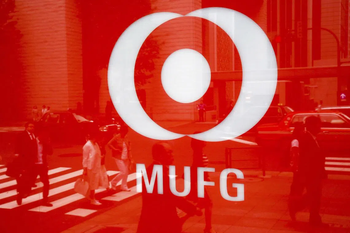 Mitsubishi UFJ Financial Group, the top bank by assets, said second-quarter profit surged 90 per cent on higher interest rates and the sale of cross-held shares. 