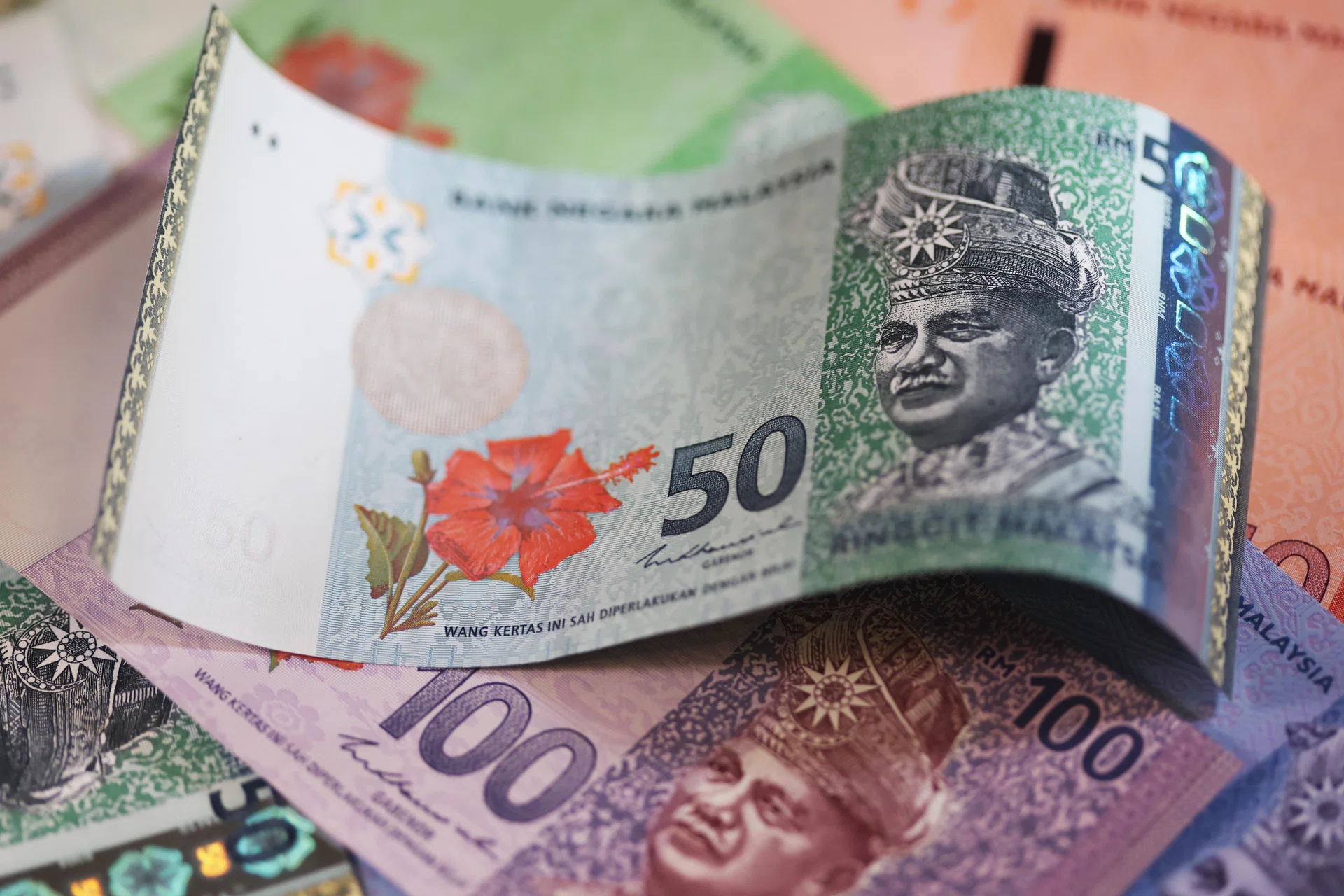 Malaysian ringgit hits highest in four years on growth optimism
