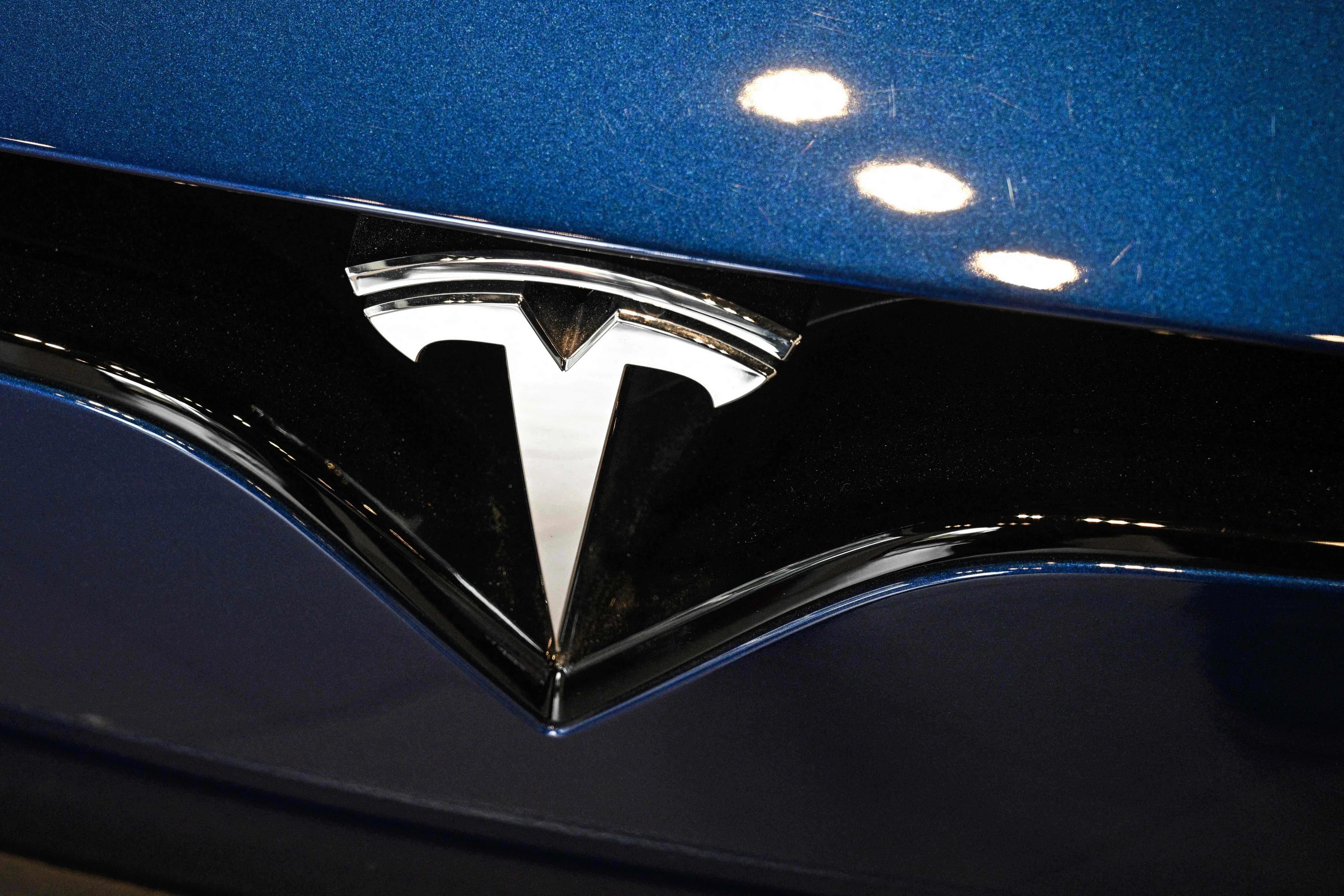 Tesla, which reports a combined sales total for the Model 3 and Model Y, delivered 481,166 of those sedans and SUVs, up 9.4% from a year ago. 