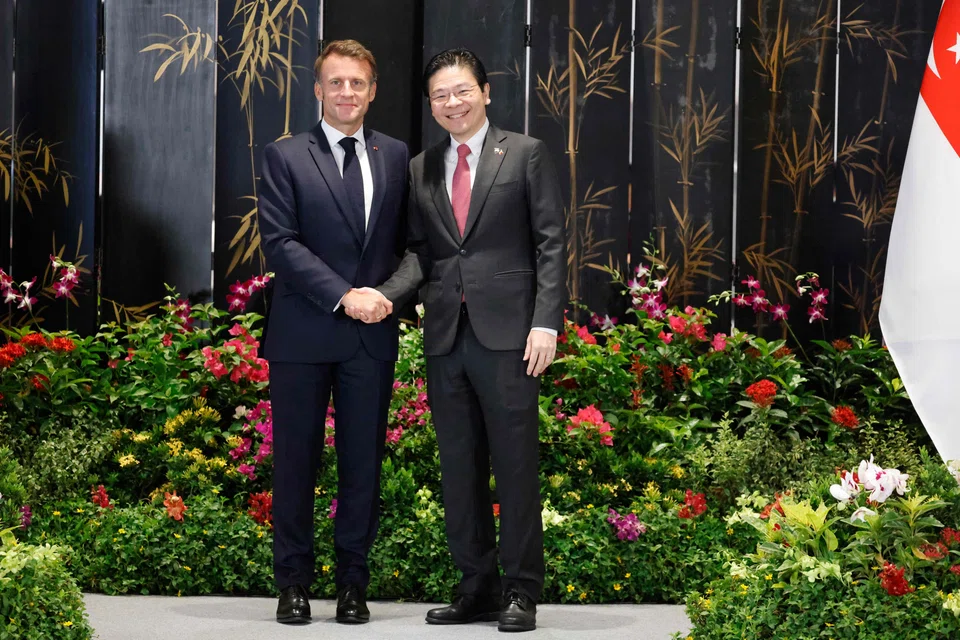 French President Emmanuel Macron (left) with Singapore Prime Minister Lawrence Wong. Both leaders witnessed the exchange of 13 agreements under the framework of the Comprehensive Strategic Partnership.