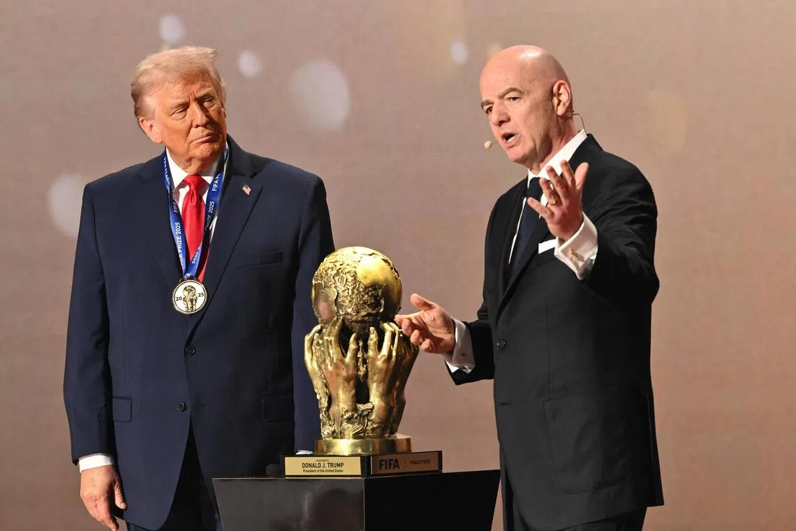 Fifa president Gianni Infantino (right) seems to have invented the Fifa Peace Prize as part of a wider effort to ingratiate himself and his organisation with US President Donald Trump. The award was handed out at a glitzy draw event in Washington for the 2026 World Cup. 