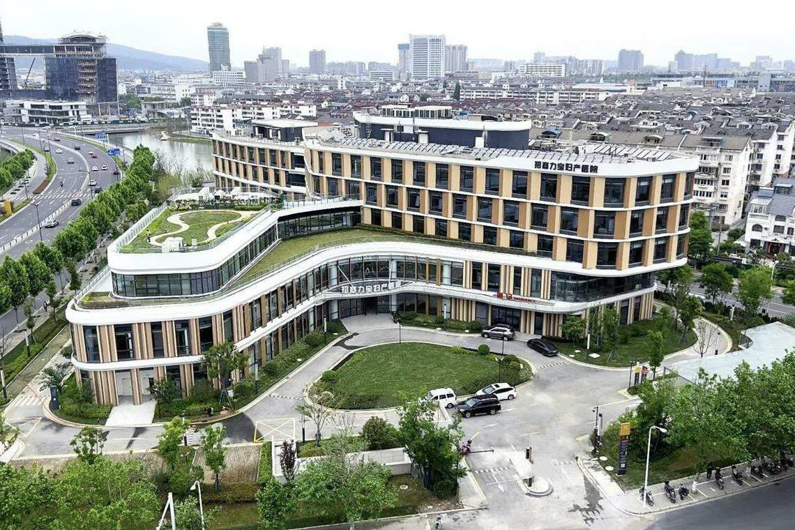 OUE Healthcare's hospital in Changshu, China. The group expects to receive net cash proceeds of approximately RM120.3 million from the sale of its Kuala Lumpur plot, which will be used for working capital purposes.