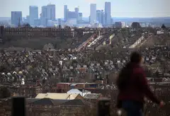 Rows of houses in front of the Canary Wharf skyline in London. The UK has concluded negotiations to join the 11-member Comprehensive and Progressive Agreement for Trans-Pacific Partnership.