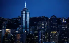 The Center skyscraper in Hong Kong. On a visit by Bloomberg News reporters in April, ceiling panels were missing in places, with long electric wires hanging from the gaps on some floors.