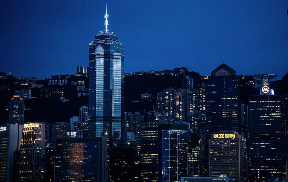 The Center skyscraper in Hong Kong. On a visit by Bloomberg News reporters in April, ceiling panels were missing in places, with long electric wires hanging from the gaps on some floors.