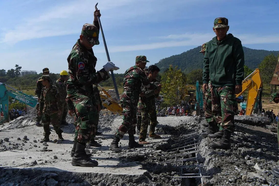 Ten dead in Cambodia building collapse, more trapped