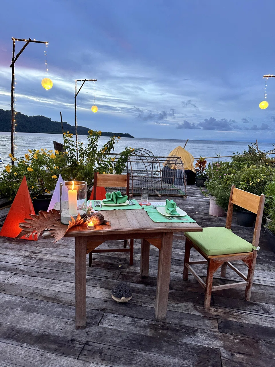 A romantic private dinner along the jetty at Ao Salat fishing village.