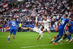 England's Jude Bellingham scores an overhead goal to equalise 1-1 against Slovakia in Gelsenkirchen, Germany, June 30, 2024. 