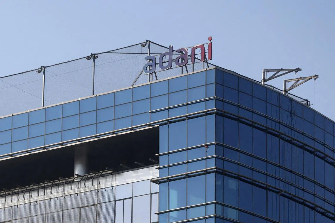 Shares and bonds of Adani Group companies swung wildly in the immediate aftermath of Hindenburg’s report but have since recovered ground.