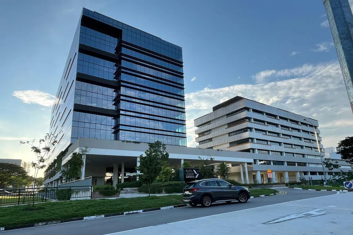Paya Lebar Green comprises the brand-new 12-storey South tower (left) and the refurbished eight-storey North tower.