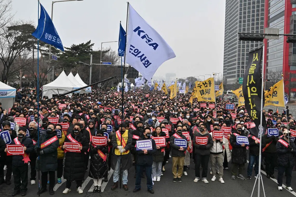 Hospitals have been forced to cancel crucial treatments and surgeries since thousands of trainee doctors stopped working Feb 20 to protest proposed training reforms, but the government has vowed not to back down, threatening striking medics with legal action.