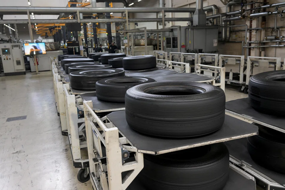 The move by the components supplier and tyre-maker is to reduce annual costs by US$428 million.