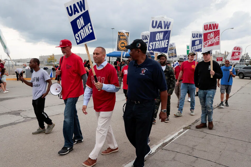 Hakeem Jeffries, Democratic Minority Leader of the US House of Representatives, walks the picket line with striking United Auto Workers members outside the Ford Motor Michigan assembly plant in Wayne, Michigan, Sept 17, 2023.  