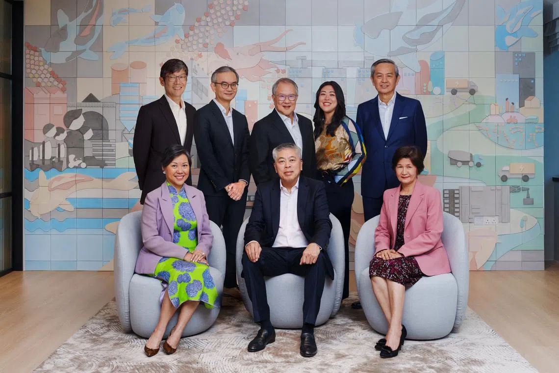 The board of directors of Hong Leong Asia, with executive chairman Kwek Leng Peck seated in the middle. Kwek Pei Xuan is fourth from the right in the back row. 
