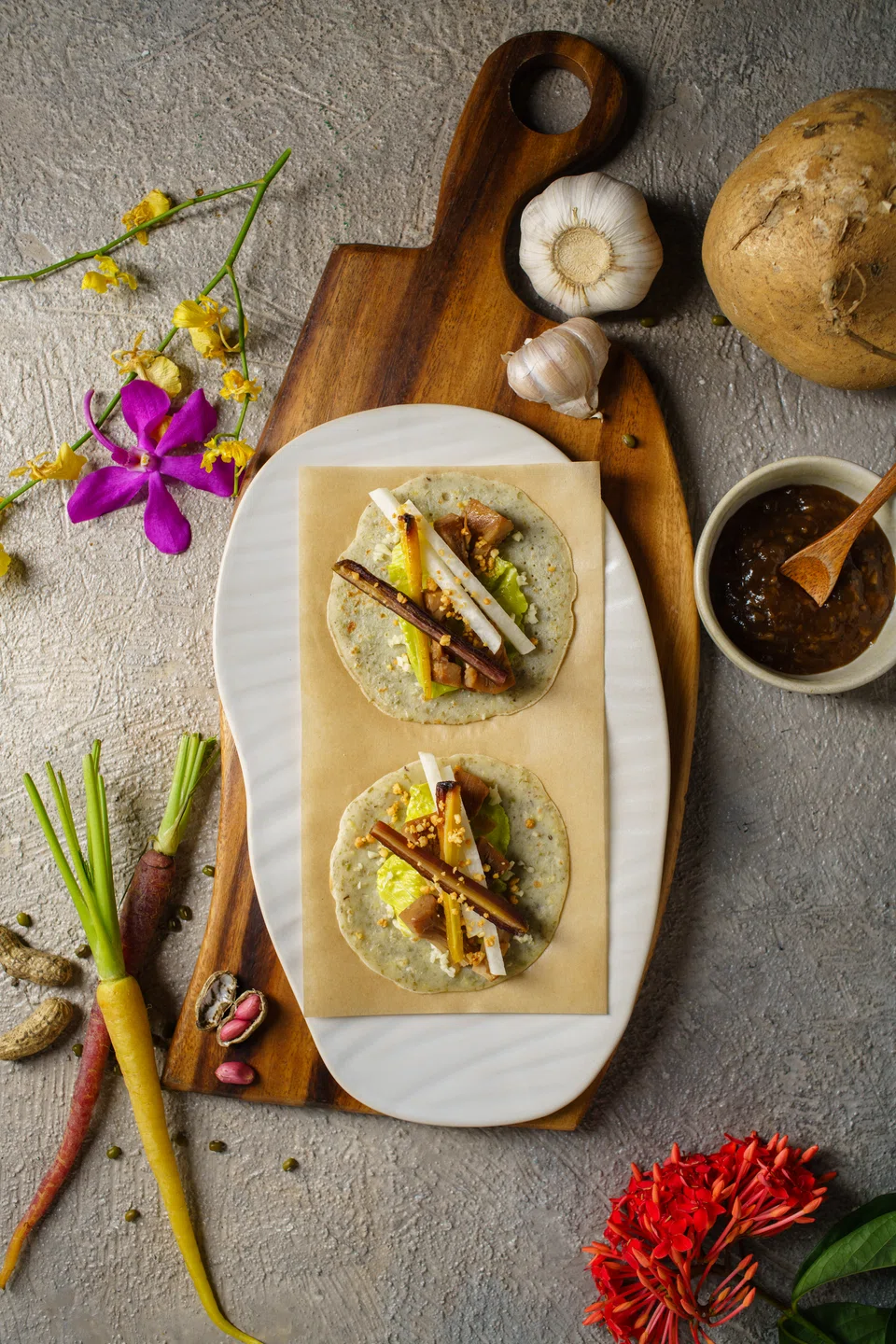 Lumpia are "open-face" wraps filled with roasted vegetables and pickles.