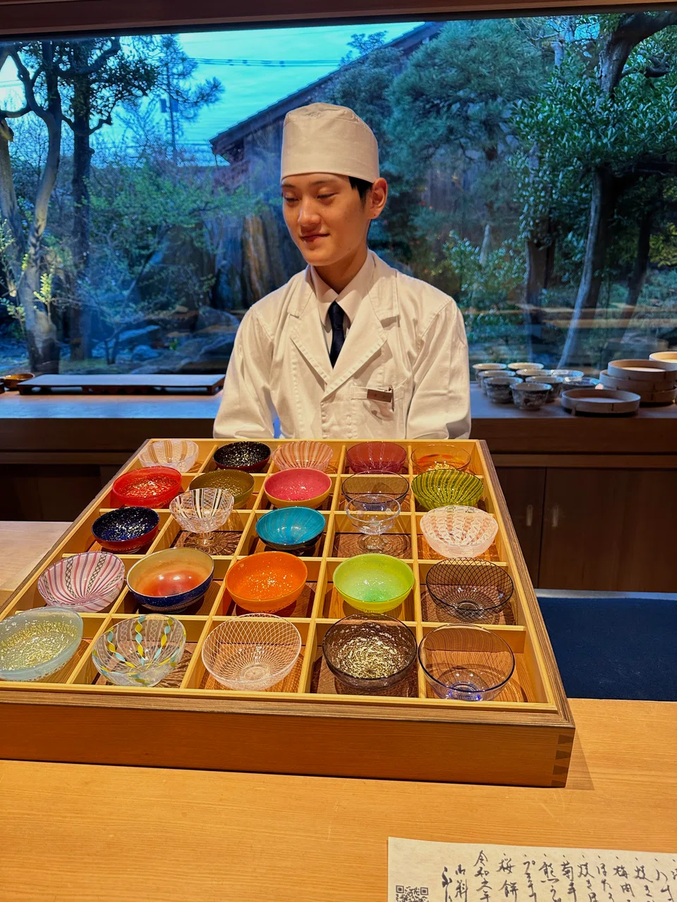 Restaurant Oryouri Fujii serves sake in beautiful glass cups made by glass artist Yasuda Taizo.