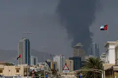 Smoke rising after an explosion due to drone debris in the industrial zone in Fujairah, United Arab Emirates, on Mar 3. Security and safety precautions are the topmost priority for South-east Asian companies with teams in the region.
