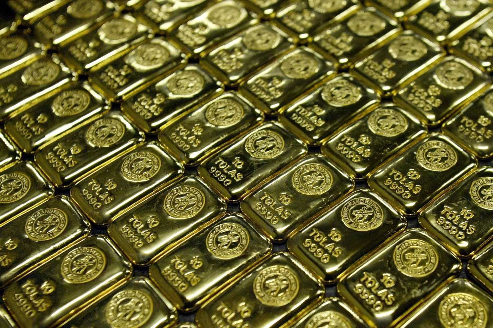 Gold slips from one-week peak as stronger US dollar weighs - The ...