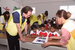 Miguel Ko (left), chairman of both CHF and CapitaLand Investment, during CapitaLand's International Volunteer Expedition in India in 2023. Education is one of the initiative's focus impact areas.