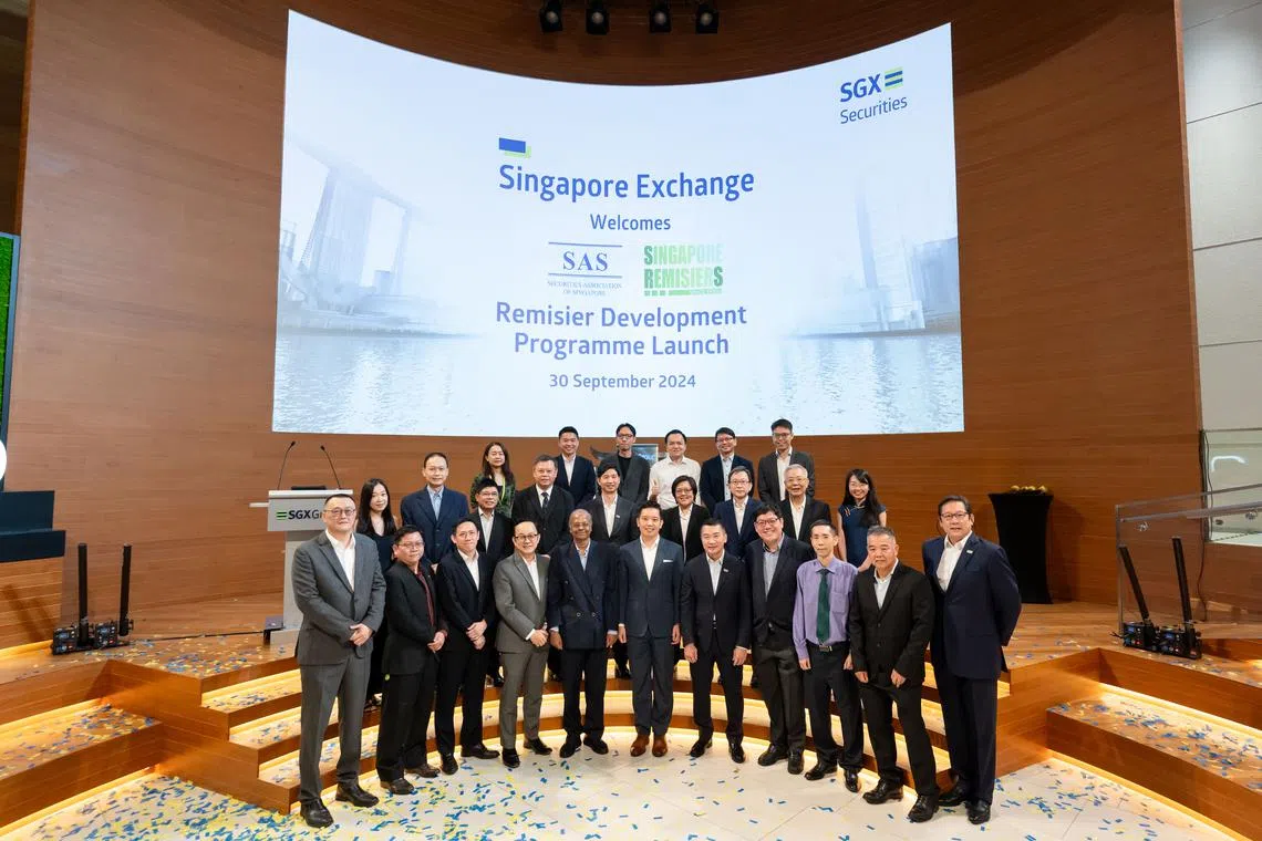 Securities industry representatives at the launch ceremony of the Remisier Development Programme, held at the SGX Centre on Monday (Sep 30). 